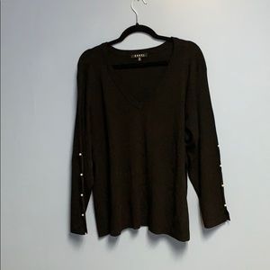 Rebel Wilson pullover sweater.